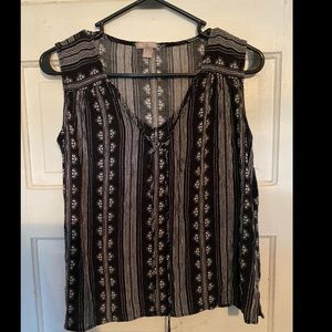 Sleeveless dress shirt.